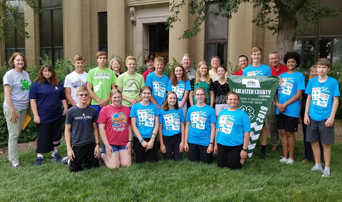 Lancaster County 4-H Teen Council receiving an Governor's Agricultural Ag Excellence award in 2019