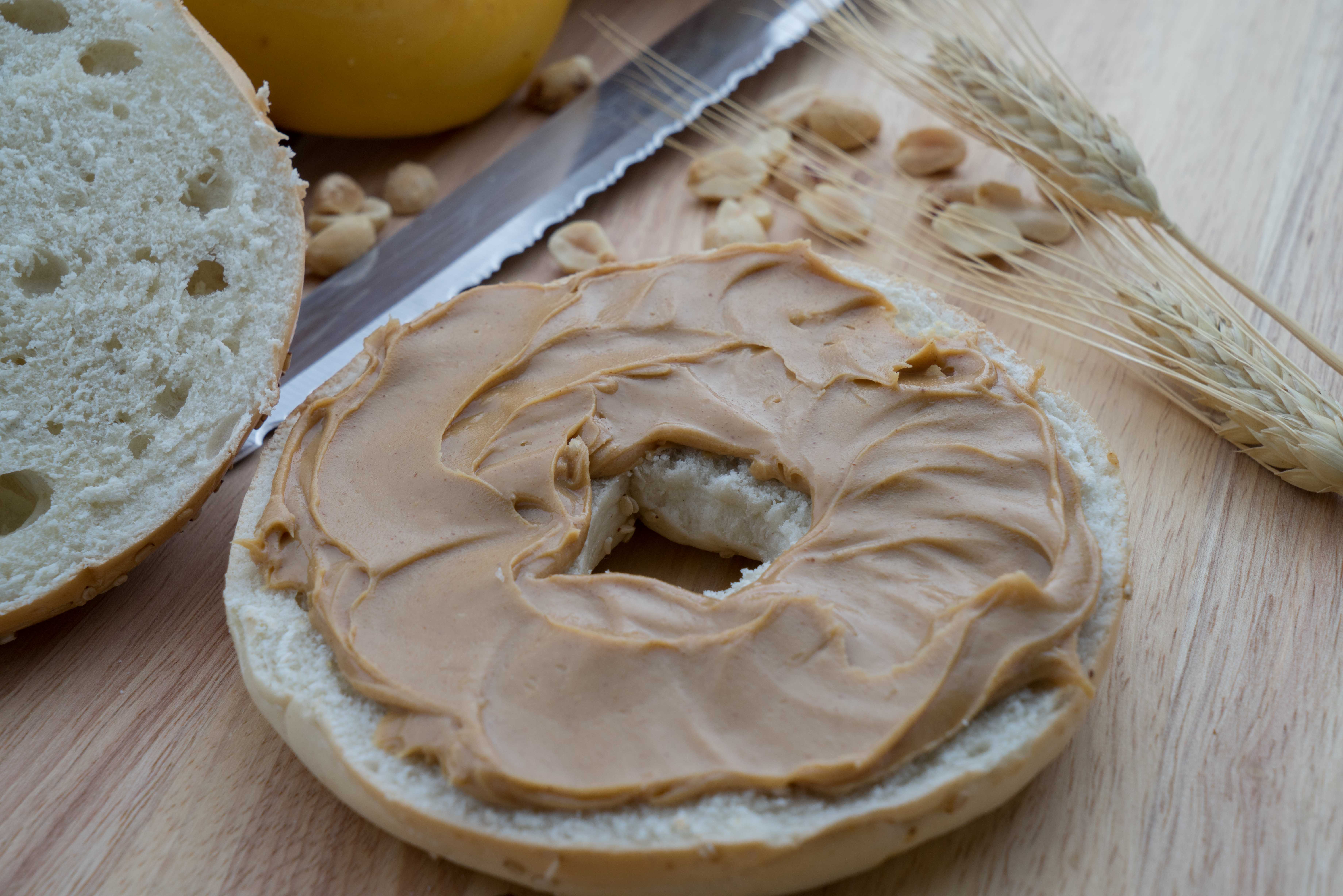 A healthy breakfast includes protein and carbs, like this whole wheat bagel and peanut butter.
