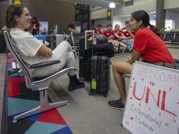 Shridula Hegde (right) talks with Katie Brooks during 2019 international student welcome activities at the Lincoln Airport. The International Welcome Team mission is to help new students smoothly transition to UNL, Lincoln and the U.S.