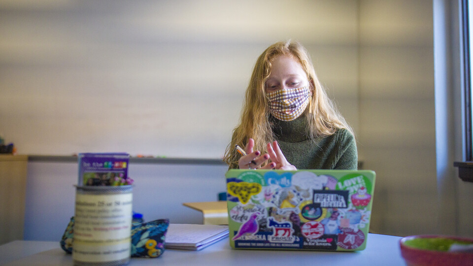  Madison Sides, a junior majoring in English, performs a writing center consultation over Zoom in the Writing Center in Andrews Hall. The physical space is closed to visitors, but any student or faculty member is able to utilize online appointments. [phot