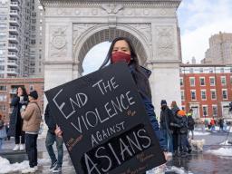 A protestor holds a sign at the End The Violence Towards Asians rally in Washington Square Park on Feb. 20, in New York City. Courtesy of Shutterstock.