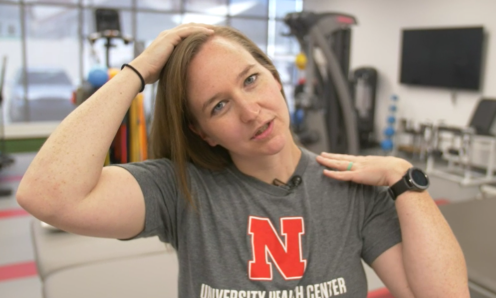 Physical Therapist Kelsey Gaston shows how to relieve neck pain and soreness.