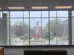 Mueller Bell Tower and the Coliseum, as seen from Love Library's second floor [photo by Kirsten Wandrey | Student Affairs]