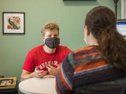 A student meets with a University Health Center psychiatry provider to discuss a concern.