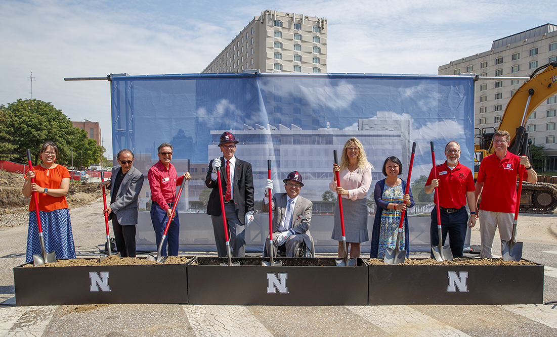 Chancellor Ronnie Green (fourth from left) joins College of Engineering administration (from left) Lily Wang, Hossein Noureddini, Sohrab Asgarpoor, Dean Lance C. Pérez, Jackie Allensworth, Yusong Li, Mark Riley and Jeff Shield – for the ceremonial dirt-tu