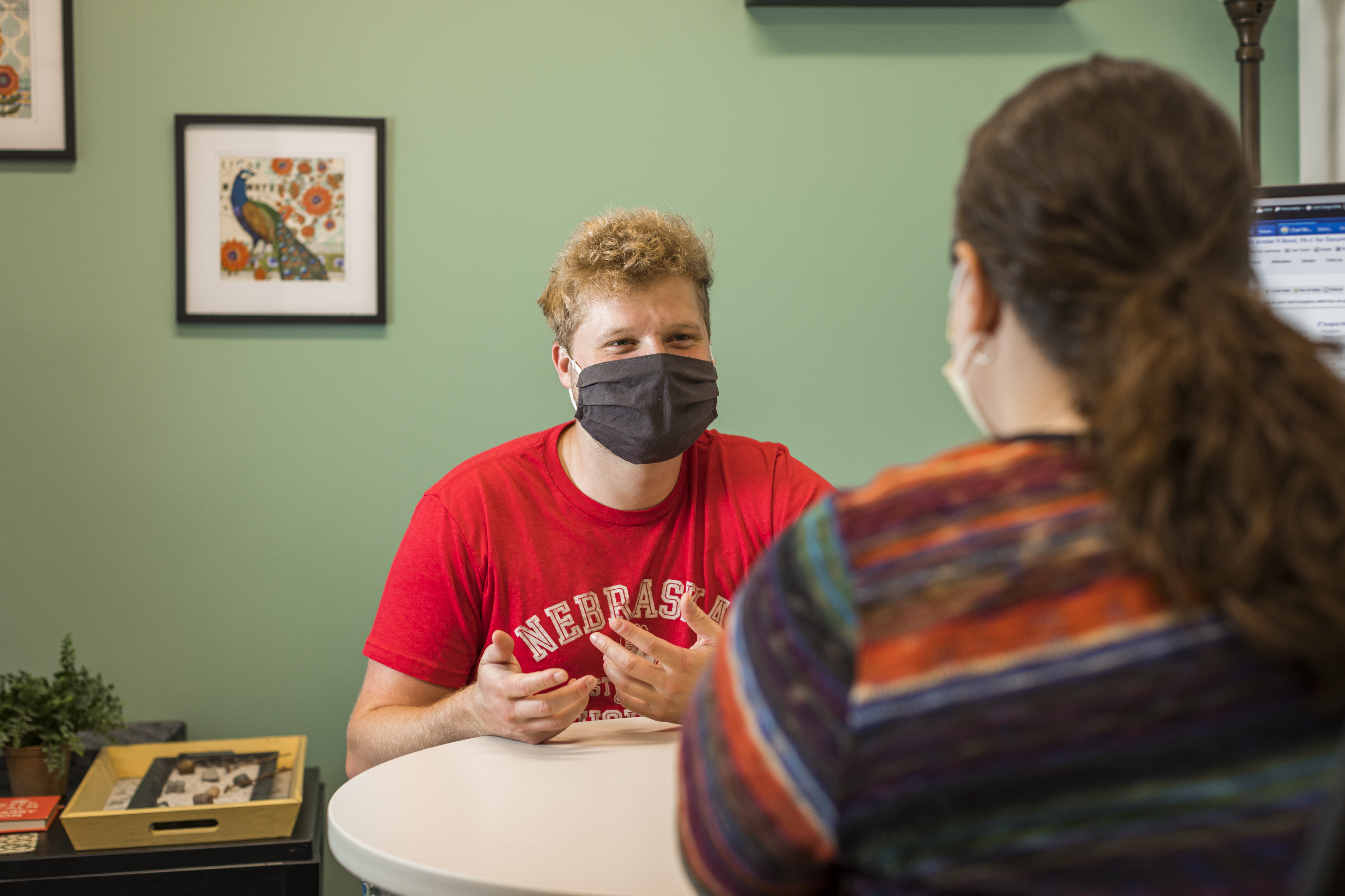 A patient talks with Amber Bond, one of the psychiatry providers at the University Health Center.