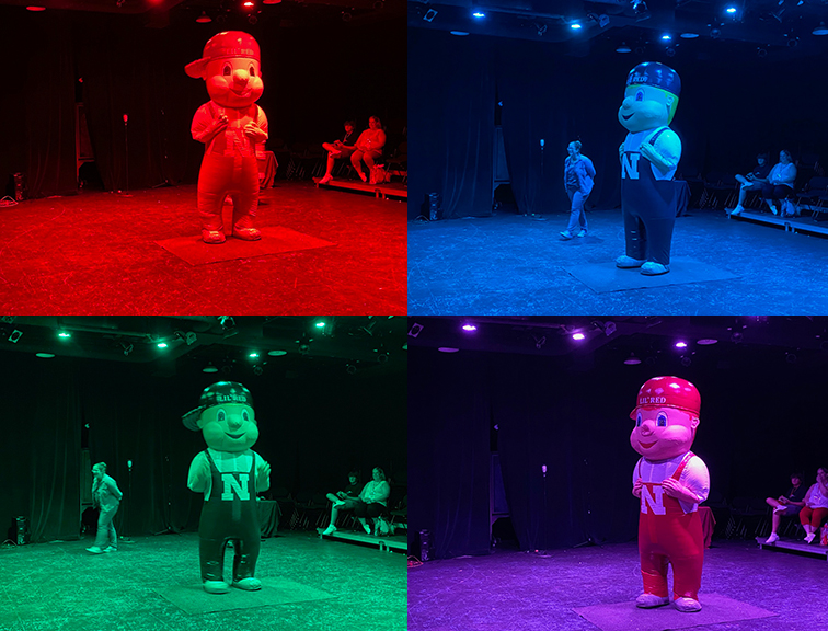 During the course “See the Light: Stage Lighting & Color” for Future Husker University, Assistant Professor of Theatre Michelle Harvey turned different colored lights on Lil’ Red so students could see what he looked like in different light.