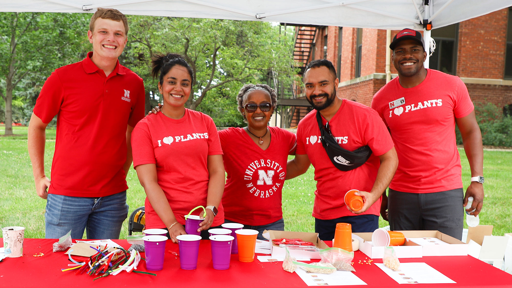 Department of Agronomy and Horticulture faculty, staff and students prepare their activity stations for the East Campus Discovery Days and Farmer’s Market.  Lana Koepke Johnson | Agronomy and Horticulture