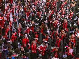 Streamers float down at the end of the undergraduate commencement ceremony Aug. 14 at Pinnacle Bank Arena.