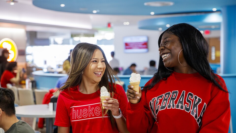 Students enjoy an ice cream cone at Cather Dining Center.