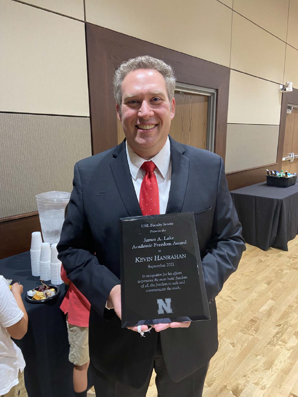 Associate Professor of Voice and Vocal Pedagogy and Director of Faculty Development for the Office of the Executive Vice Chancellor's Faculty Affairs team Kevin Hanrahan received the James A. Lake Academic Freedom Award at the Faculty Senate meeting in Se