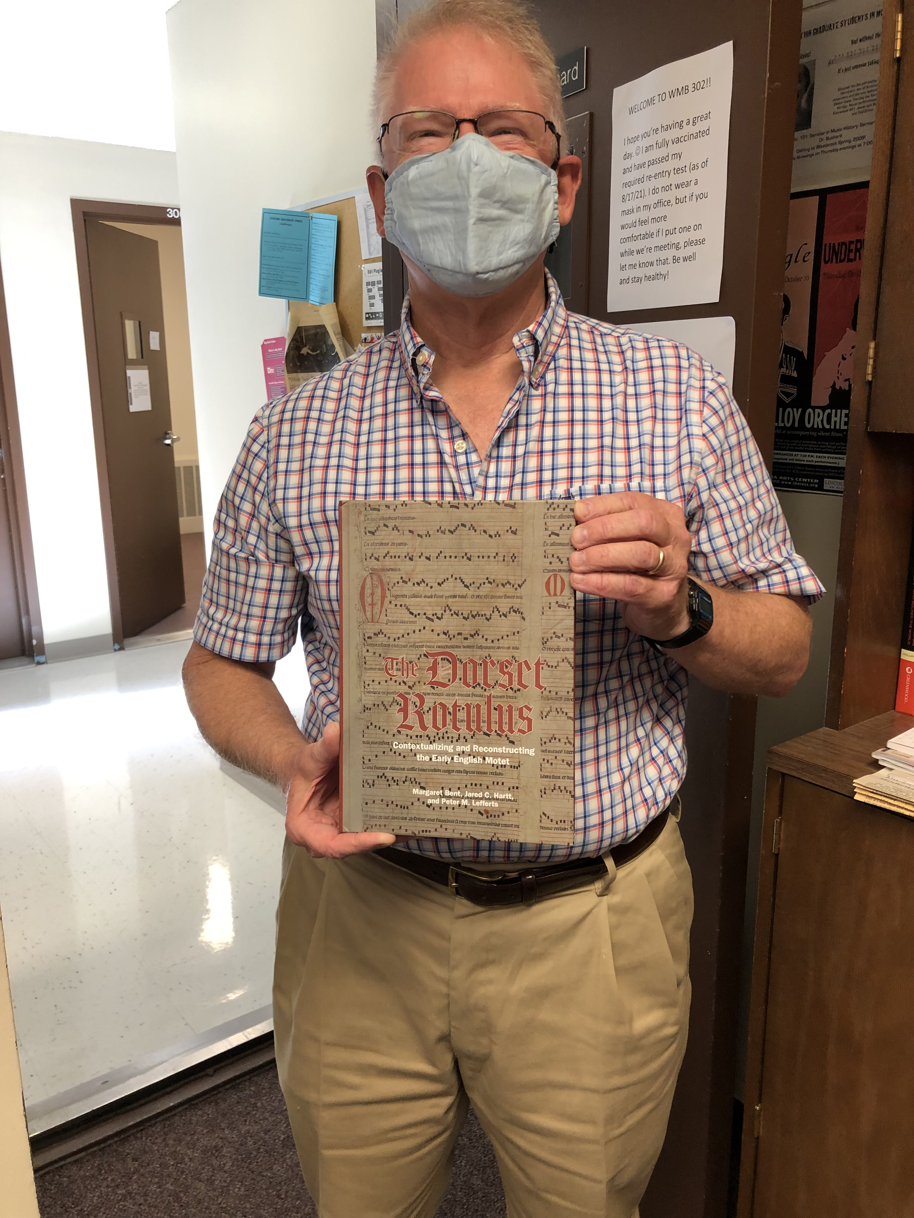 Professor of Music History Peter Lefferts with his new book, “The Dorset Rotulus: Contextualizing and Reconstructing the Early English Motet,” published by Boydell Press in London.