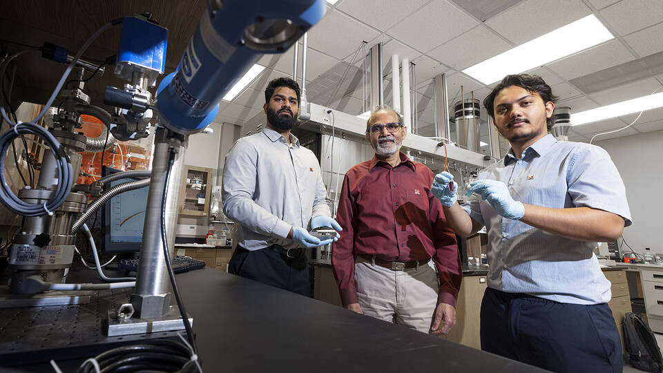 Abhijeet Prasad (left), a doctoral student in engineering; Ravi Saraf (center), Anderson Distinguished Professor of chemical and biomolecular engineering; and Aashish Subedi, a senior physics major.
