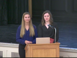 Olivia Book (left) and Carly Johnson (right) present their research on Studying the likelihood of people of who stutter being at greater risk of mental health outcomes: A Meta-Analysis