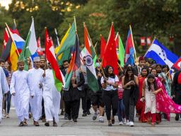 More than 100 international students carried their country’s flag at this year’s Homecoming Parade. International Education Week celebrates the multicultural diversity of the university and the opportunities available for global experiential learning.