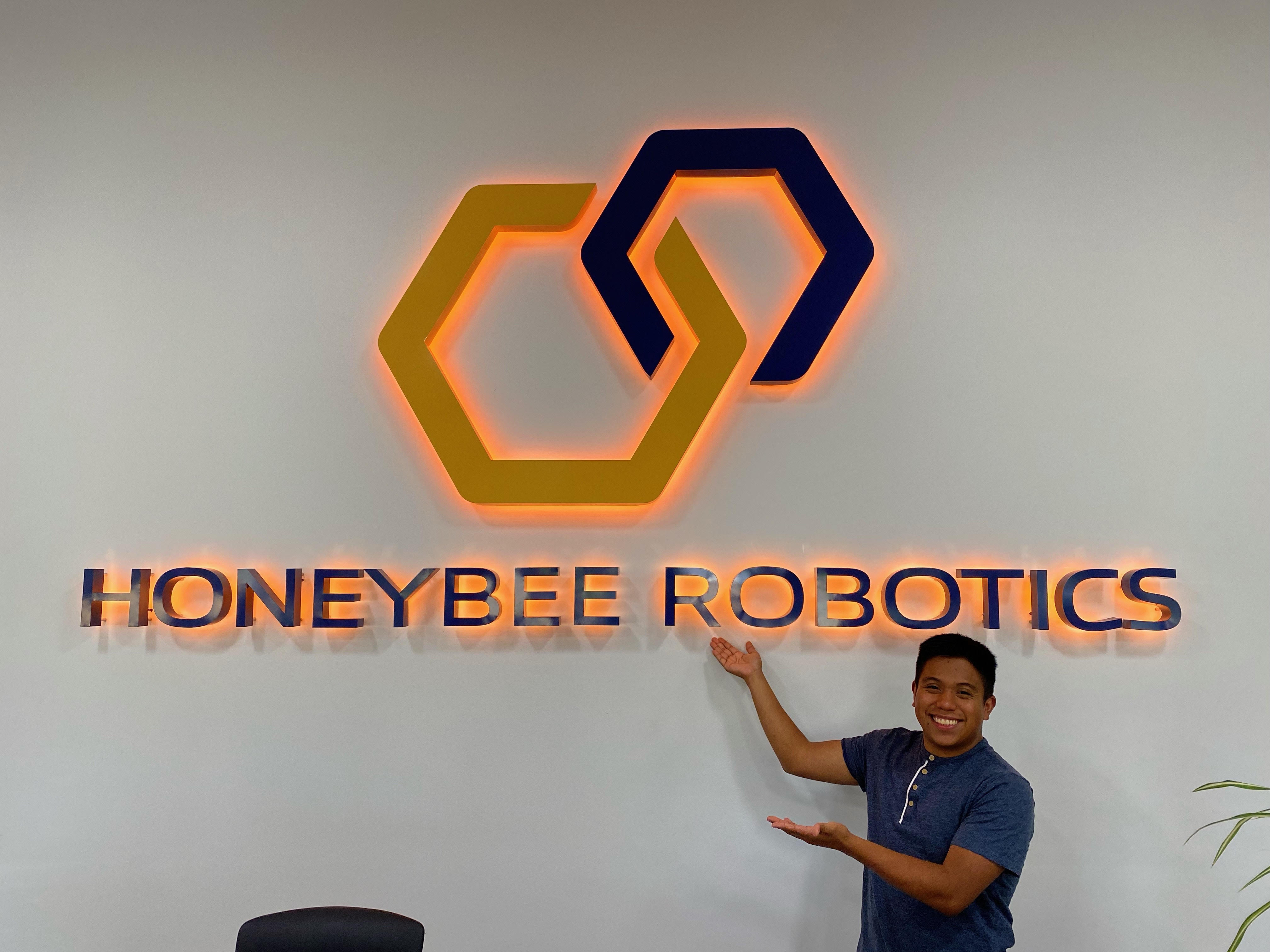 Brian Saravia Mejia showing his Honeybee Robotics pride!