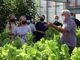 Students listen to Stacy Adams, agronomy and horticulture associate professor of practice, in the on their hydroponic projects this fall in Horticulture 307 Hydroponics For Growing Populations class.