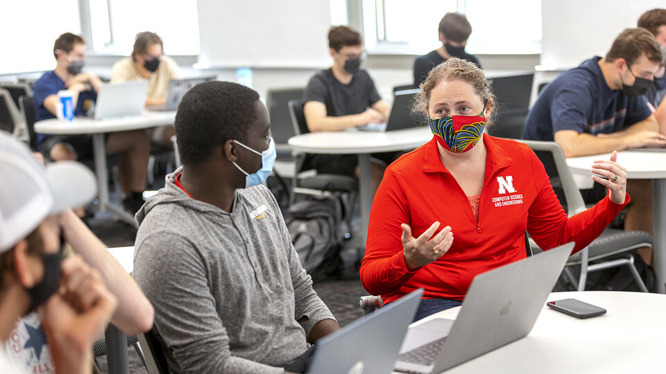 Students talk over scenarios in a Human-Computer Contact robotics course taught by Brittany Duncan. (University Communication)