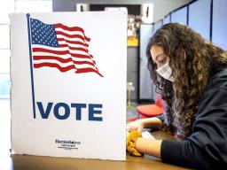 Grace Carey, a freshman from Bellevue, Nebraska, votes in her first election Nov. 3, 2020.