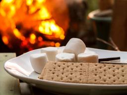 Graham crackers, marshmallows, and chocolate are the key ingredients needed to make s'mores. [Photo by Calvin Hanson from Pexels]