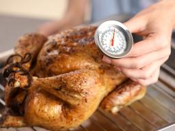 Measuring the internal temperature of cooked meats is important for holiday food safety.