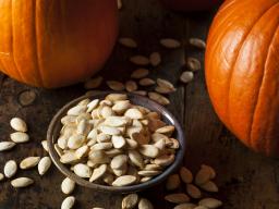 Pumpkin seeds are full of health benefits and make an easy snack. You can buy them by the bag at a local grocery store, or you can roast your own.