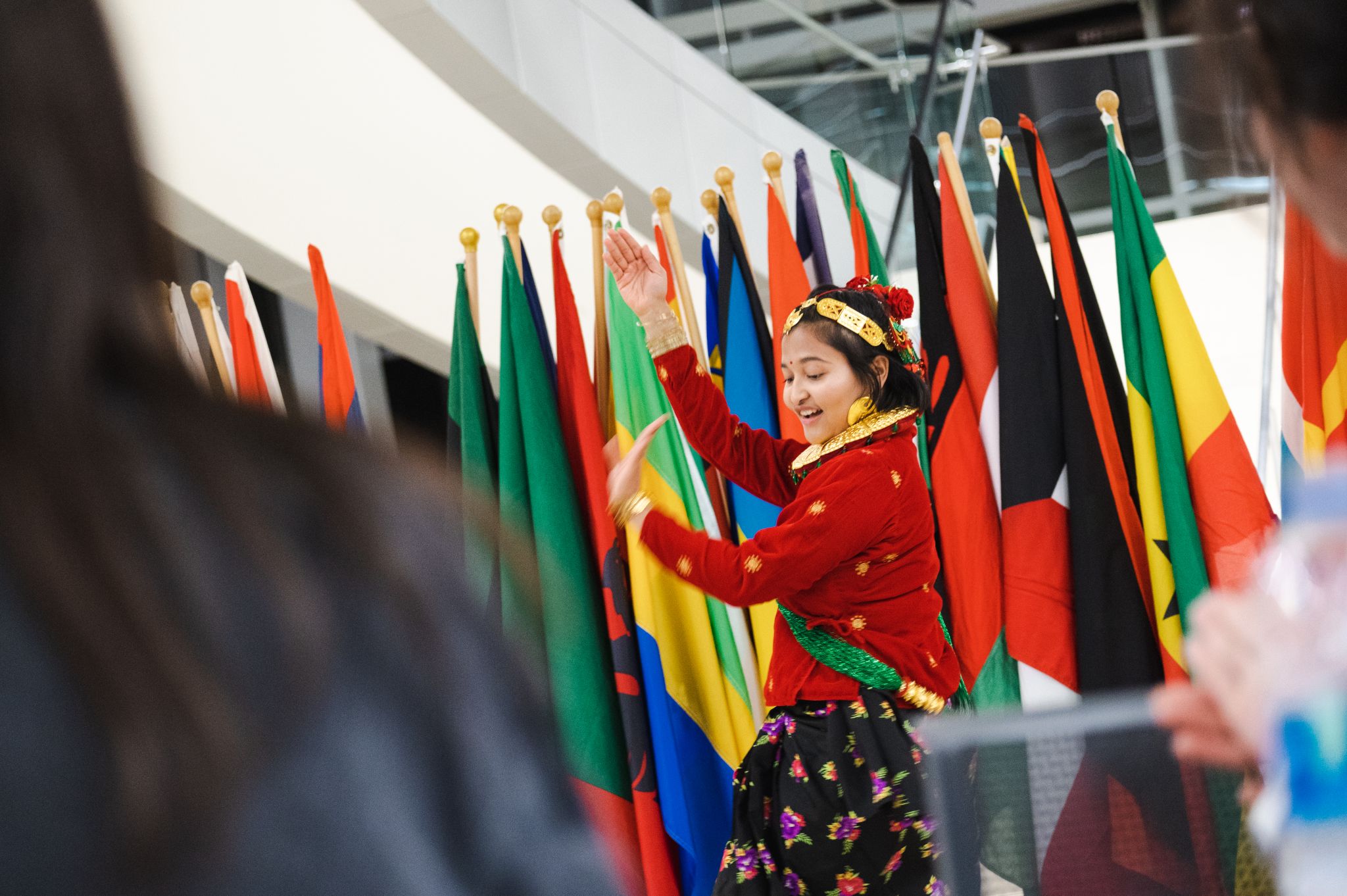 Sandhya Karki, a junior from Nepal, performs a traditional dance from her country during the signature International Education Week event, Global Cafe and Connections. © College of Business