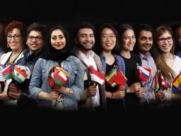 International students and faculty members stand with their national flag. The Forward Together global strategy will help Nebraska expand its global engagement and education activities.