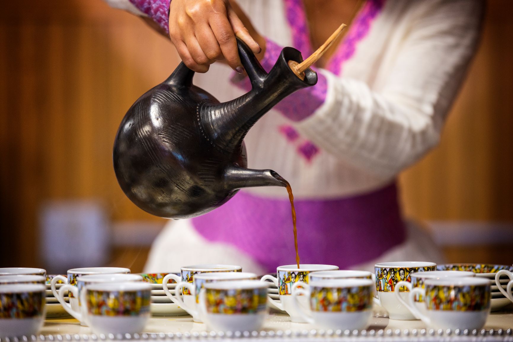 The front cover of the 2020 Global Nebraska annual report is from a traditional Ethiopian coffee ceremony recorded at a local restaurant for a Global Experience course.
