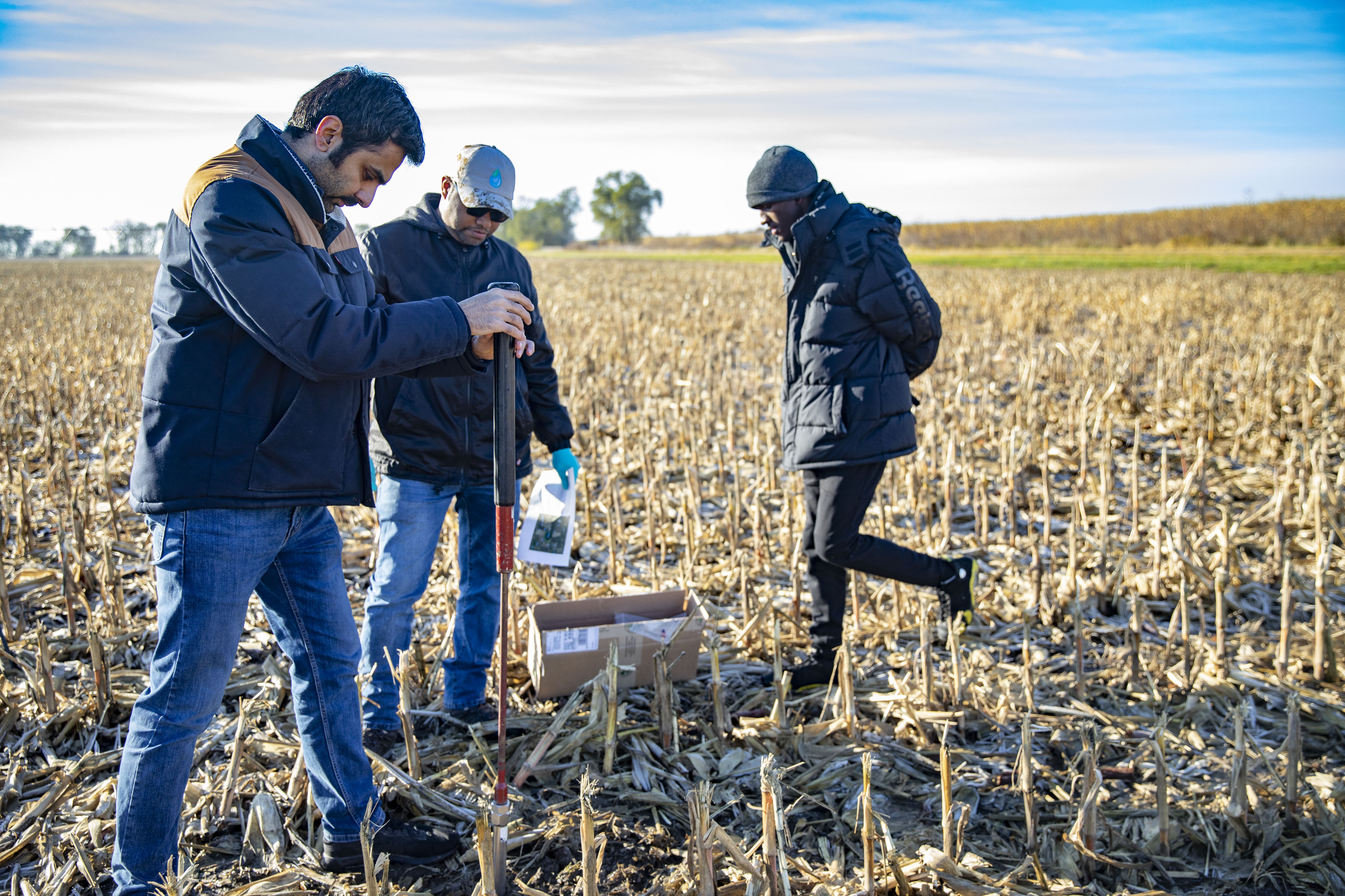 A research team from the University of Nebraska-Lincoln digs into a cornfield near Mead, NE in November to collect soil samples. The team is part of a larger research collaboration to understand the breadth and depth of contamination from the AltEn ethano