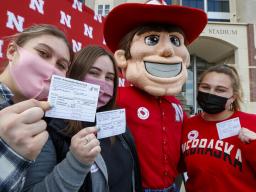 Students took time to pose with Herbie Husker after getting vaccinated in the on-campus Pfizer vaccination clinic in the spring.
