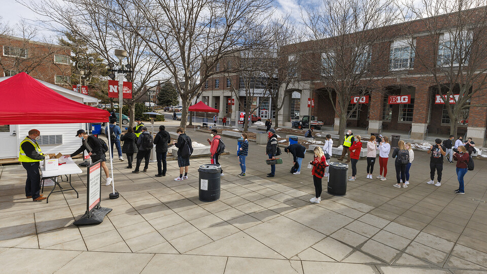 Students line up for COVID-19 testing outside the Nebraska Union as classes opened on Jan. 18. [Craig Chandler | University Communication]