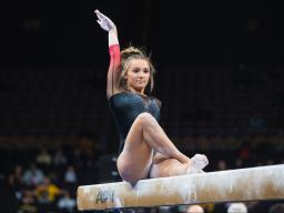 Kaitlin Higgins competes on the balance beam January 29, 2022. [photo: Nebraska Athletics huskers.com]