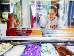 Students pick out gelato in the Abel-Sandoz Dining Center in this photo taken before face coverings were required when indoors on campus. The university has expanded availability of dining options for students this semester.