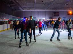 Husker students skate at the John Breslow Ice Hockey Center during a Glow Big Red event in February 2020. Campus Recreation hosts free open skating on select Friday and Saturday nights at the Breslow Center.