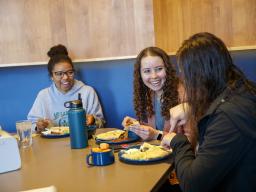 Students enjoy a meal at the Abel Dining Center.