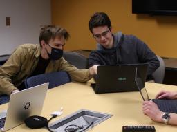 School of Computing Senior Design students (from left) Cole Vaske, Will Swiston and Cody Binder work on their collaborative project with the Nebraska Water Center and the School of Natural Resources. 