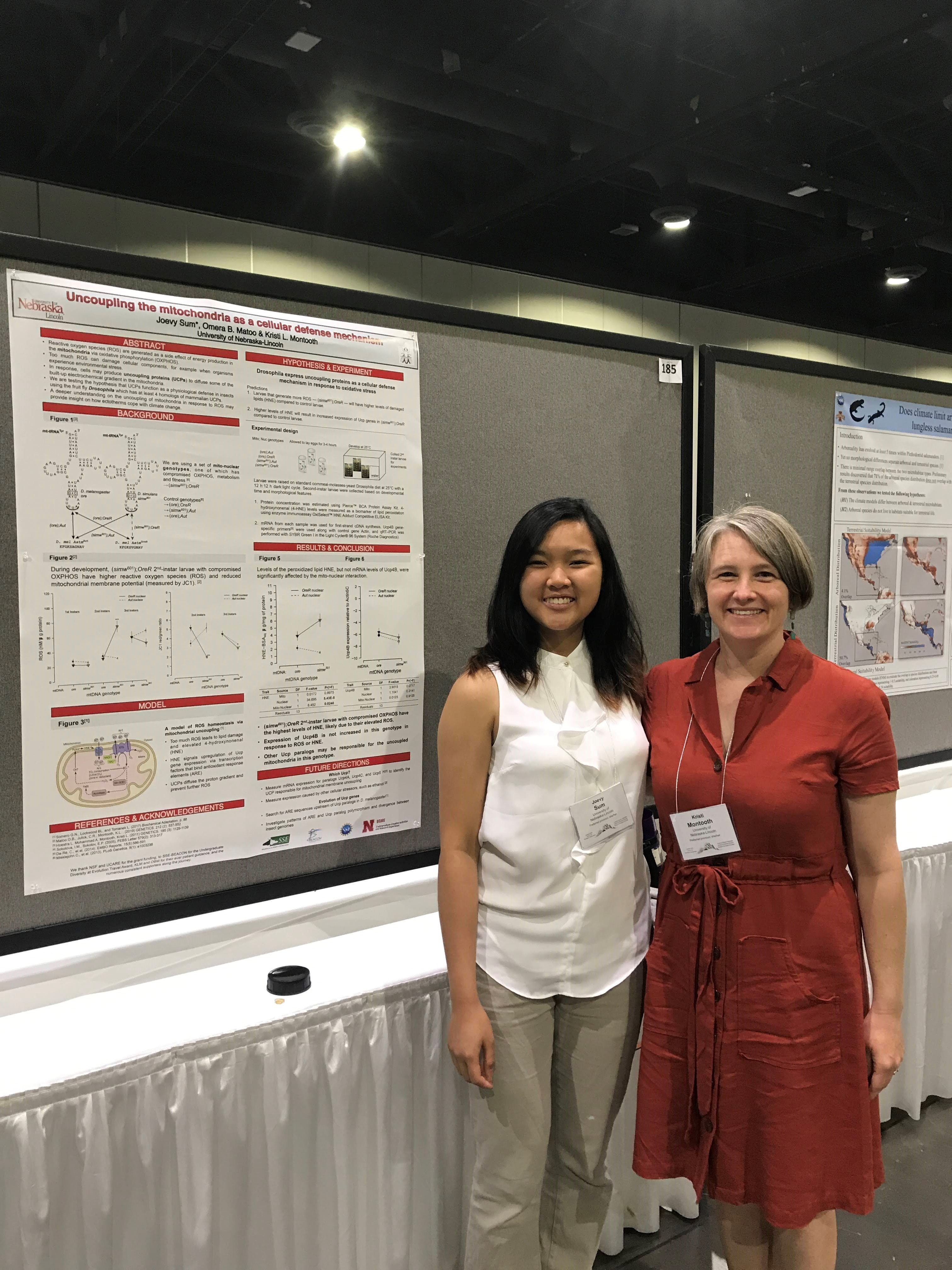 Joevy Sum (left), the 2021 awardee of the Ngaruiya Family Fund for Undergraduate Research scholarship, stands with her research mentor, Kristi Montooth.