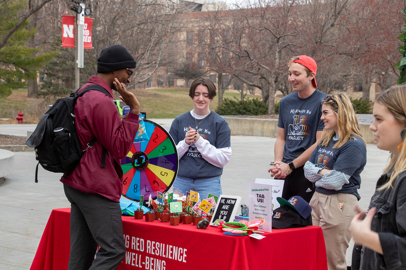 Volunteers host a program on campus aimed at teaching peers how to check in and offer support for mental health.