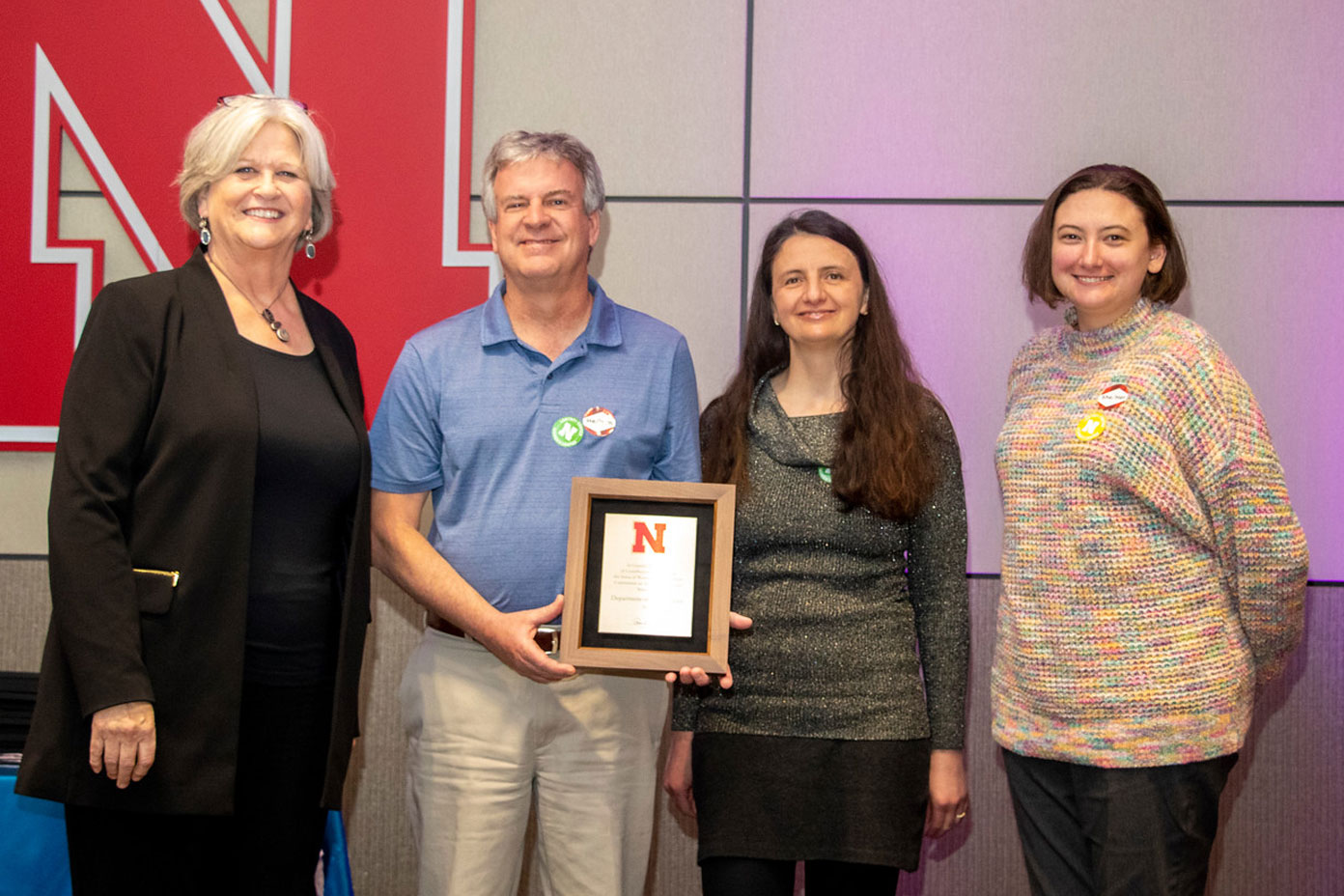 (From left to right) Executive Vice Chancellor Kathy Ankerson, math department chair Tom Marley, undergraduate chair Petronela Radu and lecturer Alyssa Whittemore