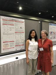Joevy Sum (left), the 2021 awardee of the Ngaruiya Family Fund for Undergraduate Research scholarship, stands with her research mentor, Kristi Montooth.