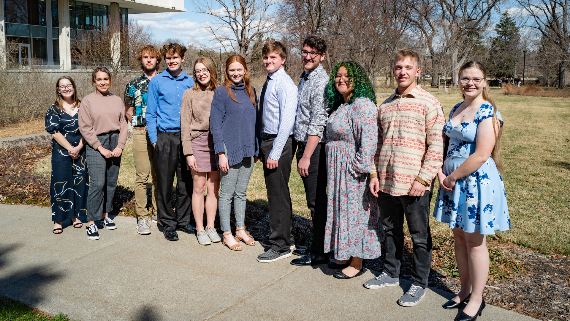 Alpha Gamma Chapter inductees pose with past officers. Jamie Dasenbrock (from left), Sage Eckard, Cole Hammett, Benjamin Knudsen, Tori Boden, Macey Wooldrik, Jacob Nichols, Jacob Hillis, Deanna Montanez Mendoza, Nathan Starr and Elizabeth Cunningham.