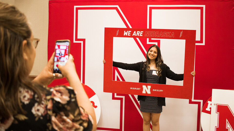 A 2022 Nebraska College Preparatory Academy graduate from Grand Island celebrates becoming a Husker during the April 27 event.