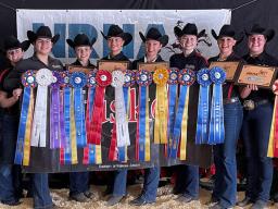 The Husker equestrian team recently won the IHSA Western Semifinals hosted by Texas Tech University. Team members (from left) are Megan Pokorny, Cassidy Chase, Taylor Pivonka, Emily Jonas, Hadley Olson, Emily Burnside, Taylor Dynek, Sarah Eberspacher and 