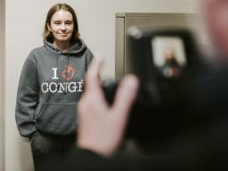 Junior Grace Gawecki poses for her application photo at the UNL Passport Office. Gawecki was one of 88 students who received funding through the first Husker Passport Giveaway in 2020 to apply for her first U.S. passport.