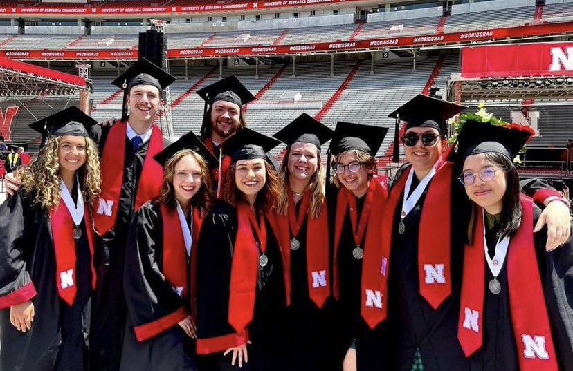 Left to right: Payton Bergkamp, Mike Rapsys, Kayla LaPoure, Mitchell Guynan, Allison Lund, Megan Whisenhunt, Madeline Schmit, Angela Walsh and Annie Wang are the first Emerging Media Arts alumni. Courtesy photo.