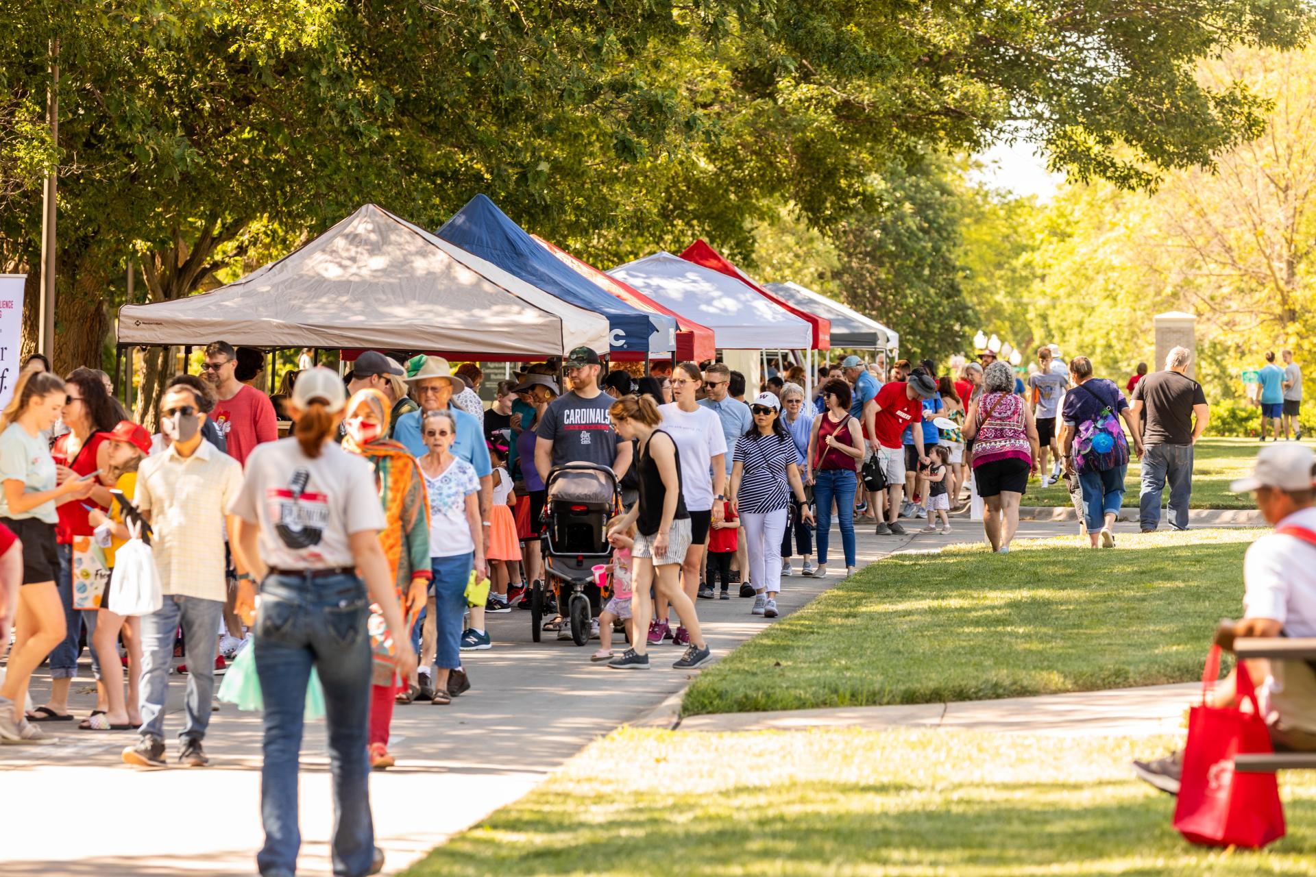 Patrons enjoy the East Campus Discovery Days and Farmer's Market.