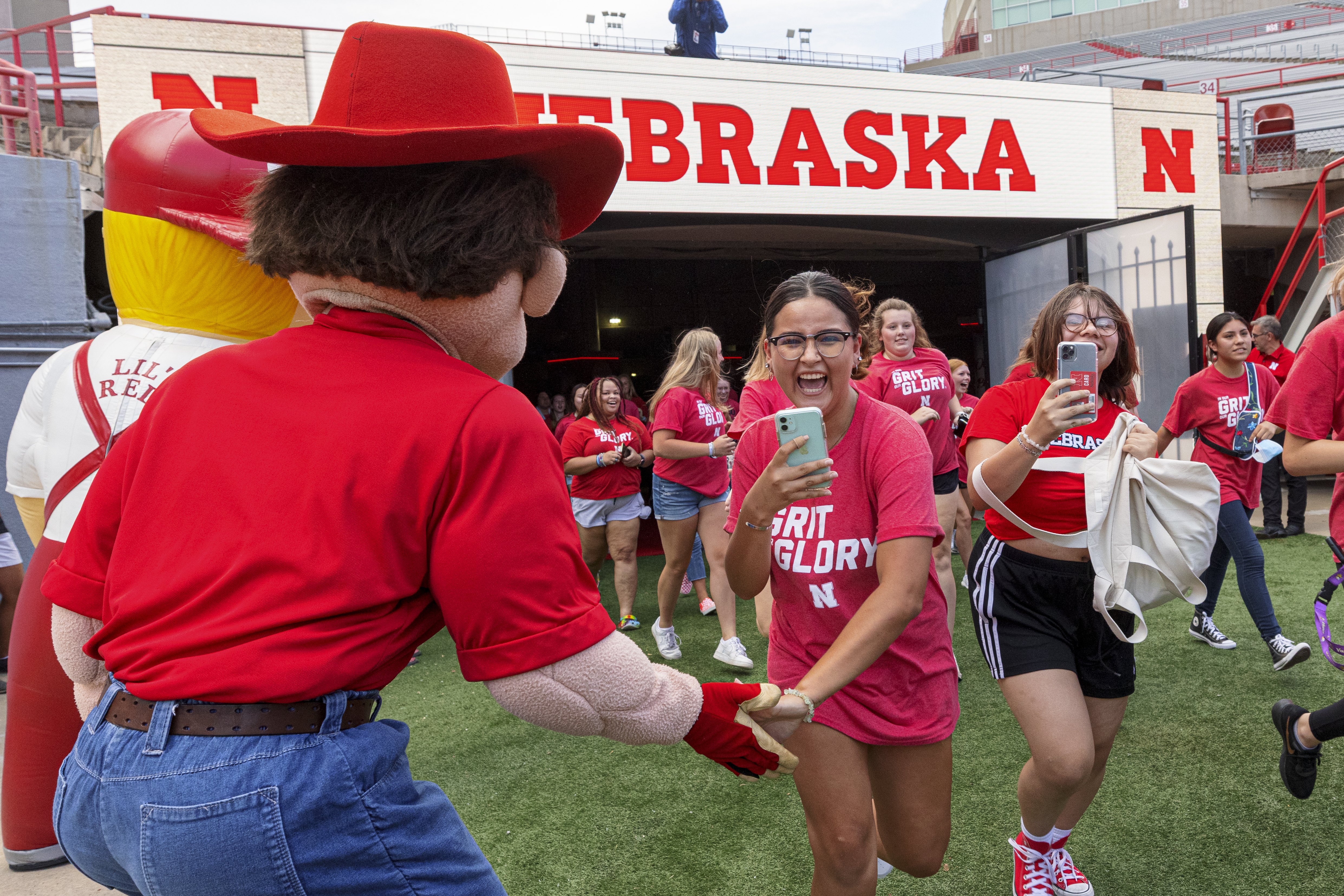 At the new student welcome, incoming students get to participate in Nebraska's tunnel walk in Memorial Stadium.