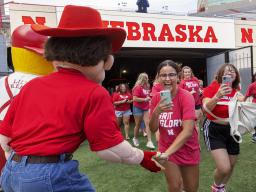 At the new student welcome, incoming students get to participate in Nebraska's tunnel walk in Memorial Stadium.