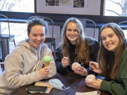 Students enjoy ice cream at the UNL Dairy Store. One lucky Husker student will win a Dairy Store Prize Pack by playing the final 2022 BRW Challenge game in the Goosechase app. 